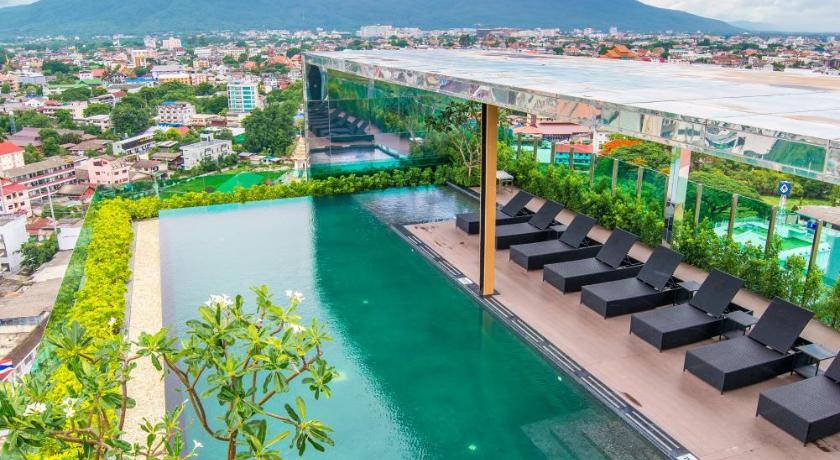 a bridge over a river with a train on it, The Astra A719 in Chiang Mai a bridge over a river with a train on it, The Astra A719 in Chiang Mai