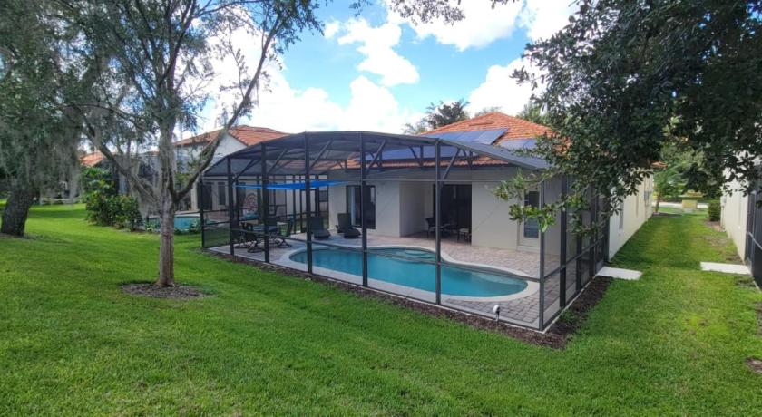 Cheerful 4bed 3bath with pool home near Disney