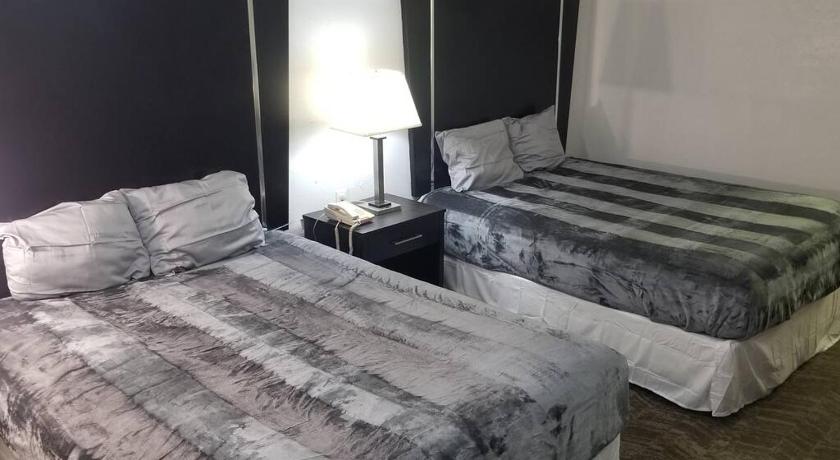 Hotel 2 Queen Beds Room 124 Booking