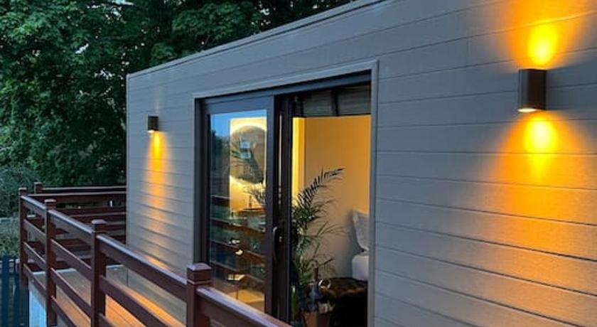 Luxurious cabin with desk & mini library