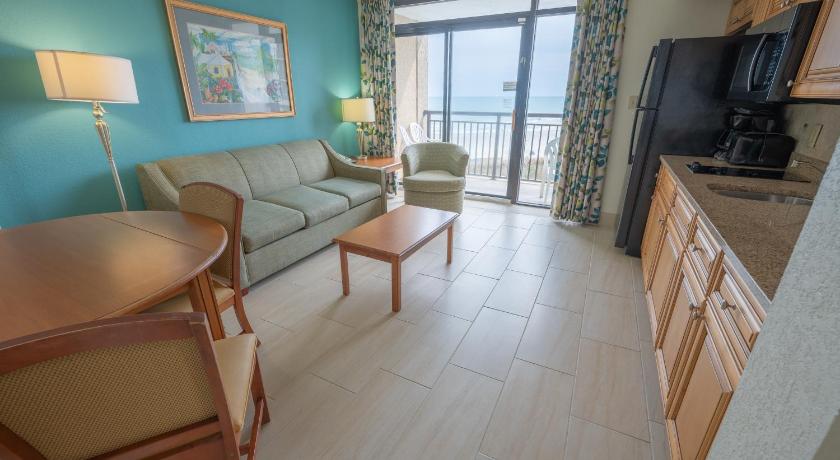 Coastal condo w beach access & hot tub