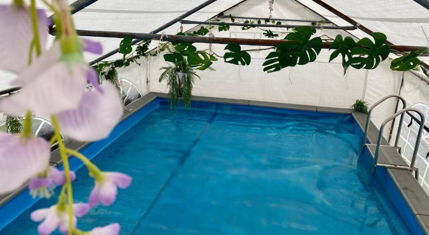 Mini Love Island style guest house includes personal warm 24 hour swimming pool, outdoor bathtub, BB