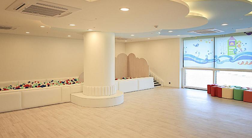 a bathroom with a large tub and a large window, Lapis Hotel Namhae in Namhae-gun a bathroom with a large tub and a large window, Lapis Hotel Namhae in Namhae-gun