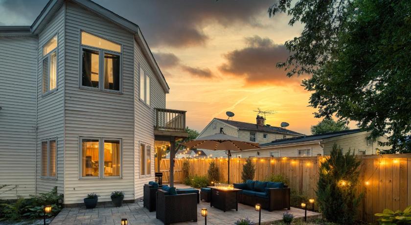 Patio Paradise Stylish 3BR Home with Gaming Room