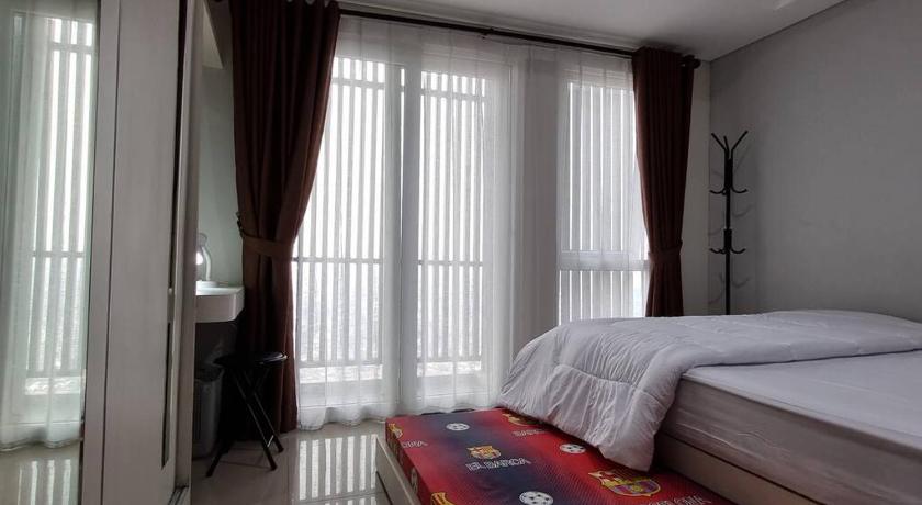 Apt Breeze Bintaro 1BR with Pool, Wi-Fi and Netflix by Damaresa