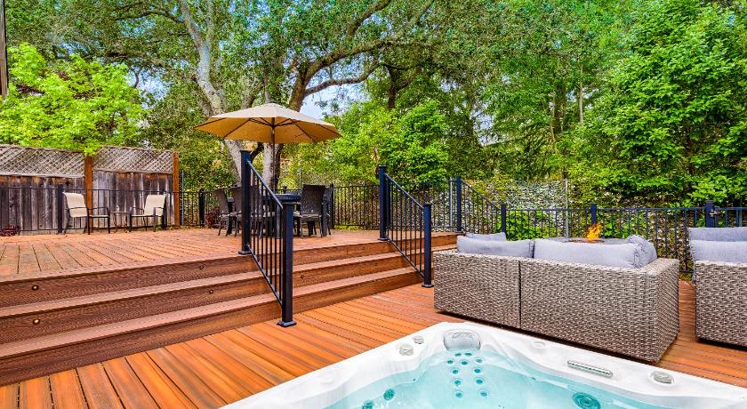 Spacious 4BD 3BA with hot tub, fire pit, and wraparound deck