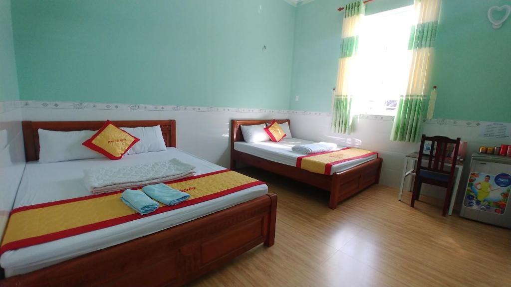 Ảnh Trúc Nguyên - Vĩnh Hy Homestay (Truc Nguyen - Vinh Hy Homestay) Phòng 4 Người (Quadruple Room) 1