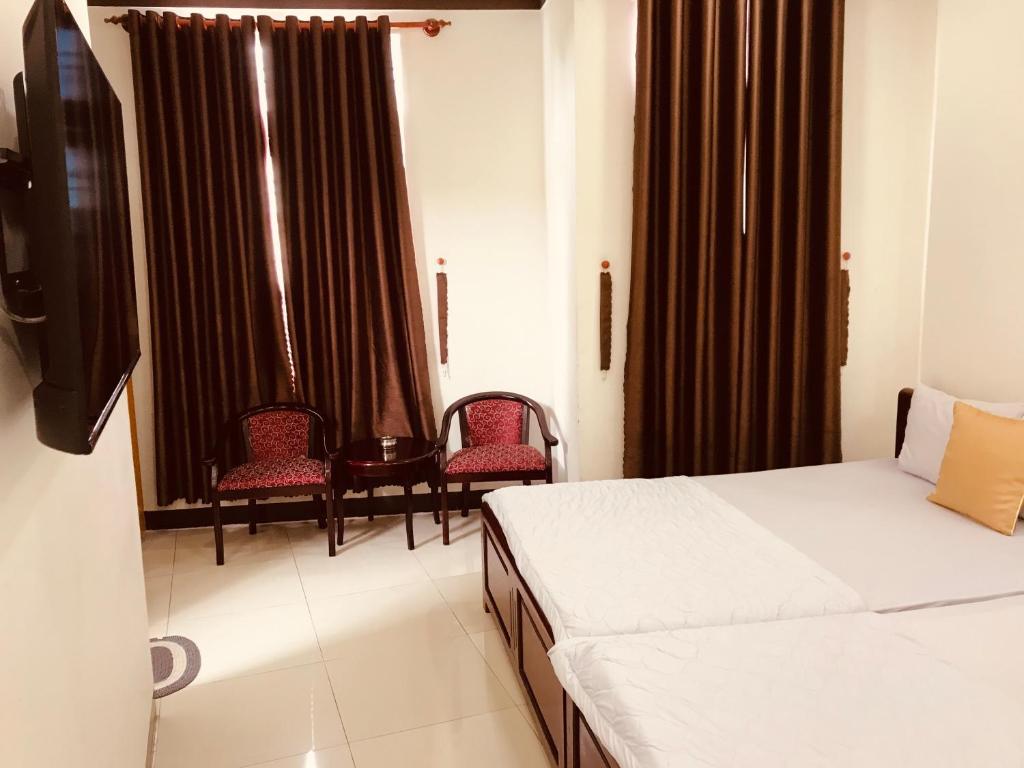 Ảnh Khach san Thu Thao Phòng 4 Người Có Ban Công (Quadruple Room with Balcony) 1