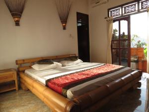 Phòng Deluxe Giường Đôi Với Ban Công và Tầm Nhìn Ra Biển (Deluxe Double Room with Balcony and Sea View)