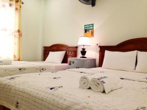 Phòng 3 người - 1 giường đôi và 1 giường đơn (Triple - 1 Double + 1 Single Bed)