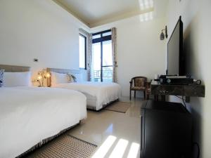 Phòng 4 Người Nhìn Ra Biển (Quadruple Room with Sea View)