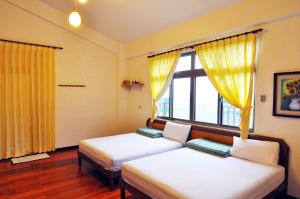 Phòng Deluxe 4 Người (Deluxe Quadruple Room)