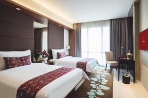 Phòng Hai Giường Đơn Loại Sang (Deluxe Twin Room)