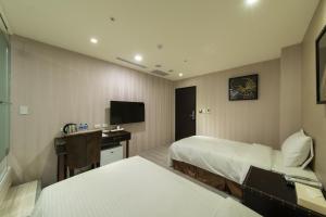 Phòng Hai Giường Đơn Tiêu Chuẩn không có Cửa Sổ (Standard Twin Room without Window)