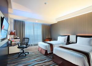 Phòng Deluxe hướng biển 2 giường đơn (Deluxe Sea View Twin Room)