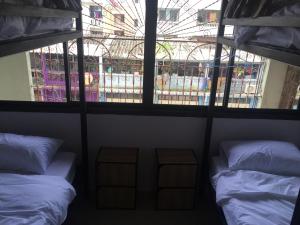 Phòng ngủ Tập thể Nữ 4 giường (4-Bed Female Dormitory Room)
