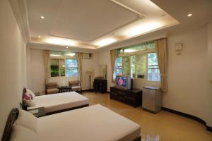 Phòng 4 người nhìn ra vườn (Quadruple Room with Garden View)