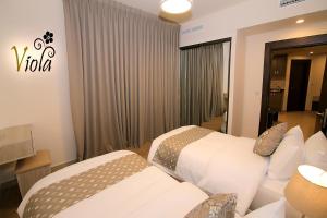 Deluxe Junior Suite room in Viola Hotel Suites
