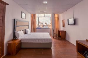 Deluxe Double Room with Balcony room in Metro Port City Hotel