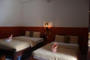 Phòng Hai Giường Đơn Loại Sang (Deluxe Twin Room)