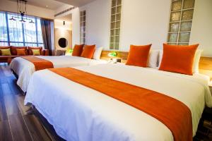Phòng Deluxe 4 Người (Deluxe Quadruple Room)