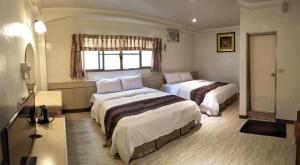 Phòng Tiêu Chuẩn 4 Người (Standard Quadruple Room)