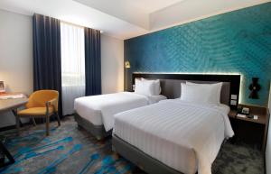 Phòng Hai Giường Đơn Loại Sang (Deluxe Twin Room)