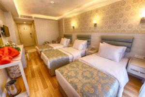 Deluxe Triple Room room in Florenta Hotel