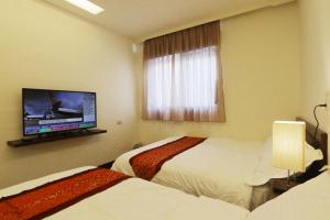 Phòng Tiêu Chuẩn 4 Người (Standard Quadruple Room)