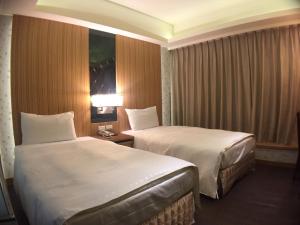 Phòng Hai Giường Đơn Loại Sang (Deluxe Twin Room)