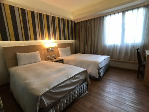 Phòng Hai Giường Đơn Loại Sang (Deluxe Twin Room)