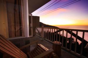 Deluxe Quadruple Room with Balcony Night View