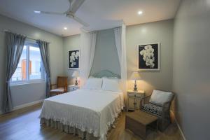 Phòng Có Giường Cỡ Queen Nhìn Ra Vườn (Queen Room with Garden View)