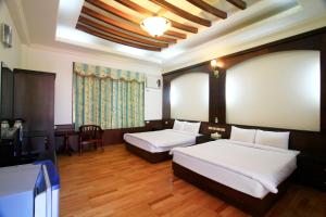 Phòng Tiêu Chuẩn 4 Người (Standard Quadruple Room)