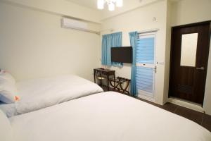 Phòng 4 Người Có Ban Công (Quadruple Room with Balcony)