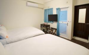 Phòng 4 Người Có Ban Công (Quadruple Room with Balcony)