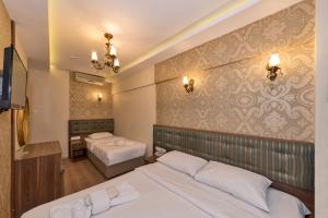 Standard Triple Room room in Sahil Boutique Hotel