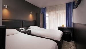 Twin Room room in Belfort Hotel