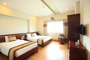 Phòng Deluxe Có 2 Giường Cỡ Queen (Deluxe Queen Room with Two Queen Beds)