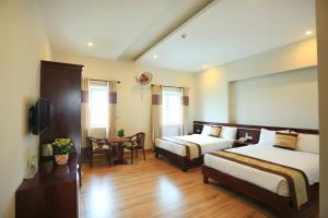Phòng Deluxe Có 2 Giường Cỡ Queen (Deluxe Queen Room with Two Queen Beds)