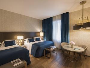 Grand Deluxe room in Rosa Grand Milano - Starhotels Collezione