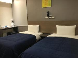 Phòng tiết kiệm 2 giường không có cửa sổ - Không có bãi đậu xe (Economy Twin Room without Window - Parking Excluded)