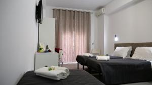 Twin Room with Balcony room in Tiburtina Royal Suites