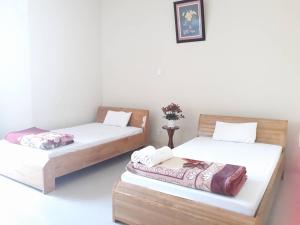 Phòng 2 giường có phòng tắm riêng (Twin Room with Private Bathroom)