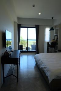 Phòng Giường Đôi có Ban công và Nhìn ra Biển (Double Room with Balcony and Sea View)