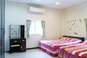 Phòng 4 người nhìn ra vườn (Quadruple Room with Garden View)