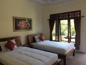 Phòng Hai Giường Đơn Loại Sang (Deluxe Twin Room)