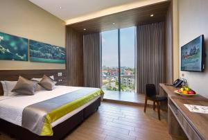 Phòng Tiêu chuẩn Giường đôi/2 Giường đơn bao gồm Vé vào công viên Wild Wild Wet Park (Standard Double or Twin Room with Wild Wild Wet Park Tickets)