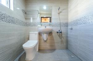 Phòng Deluxe (2 Người lớn + 1 Trẻ em) (Deluxe Room (2 Adults + 1 Child))