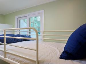Phòng ngủ Tập thể Nữ 4 giường (4-Bed Female Dormitory Room)